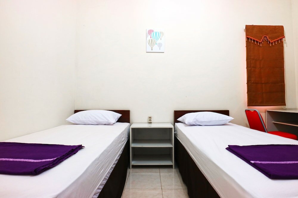 Фото Casa Sidoluhur 17