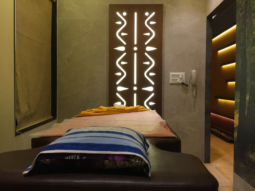 Фото Amantra Comfort Hotel