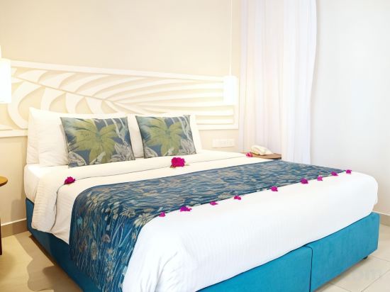 Фото Neptune Palm Beach Boutique Resort & Spa