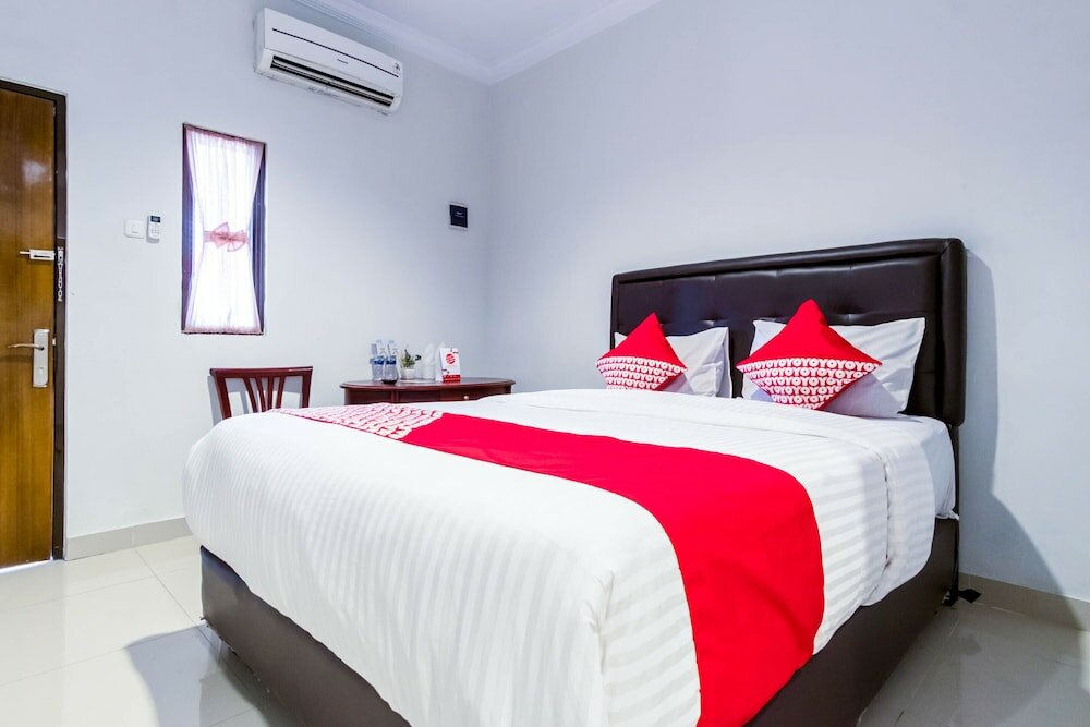 Фото Oyo 283 Helvetia Residence