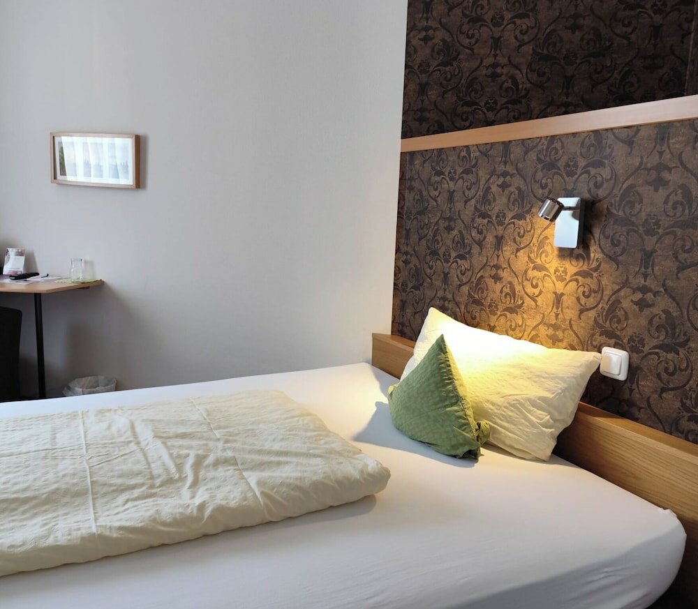 Фото Garni Hotel & Ferienwohnungen Seeschlößchen