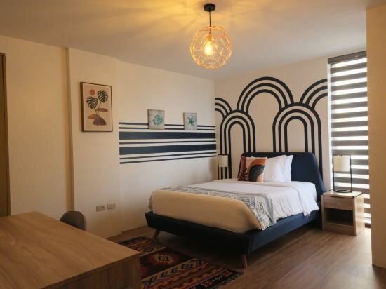 Фото Unwnd Residences Dumaguete