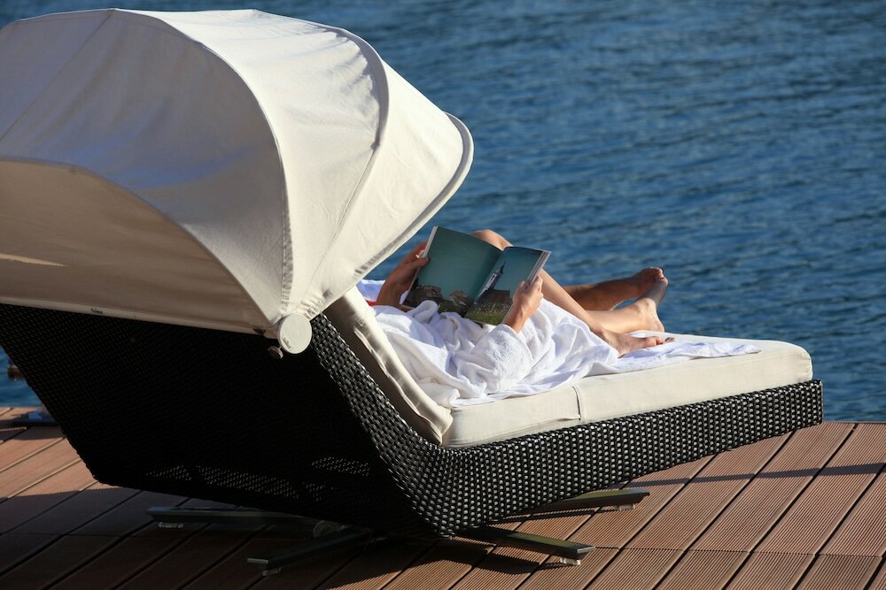 Фото Romantik Residenz Ferienwohnungen Hotel Im Weissen Rössl
