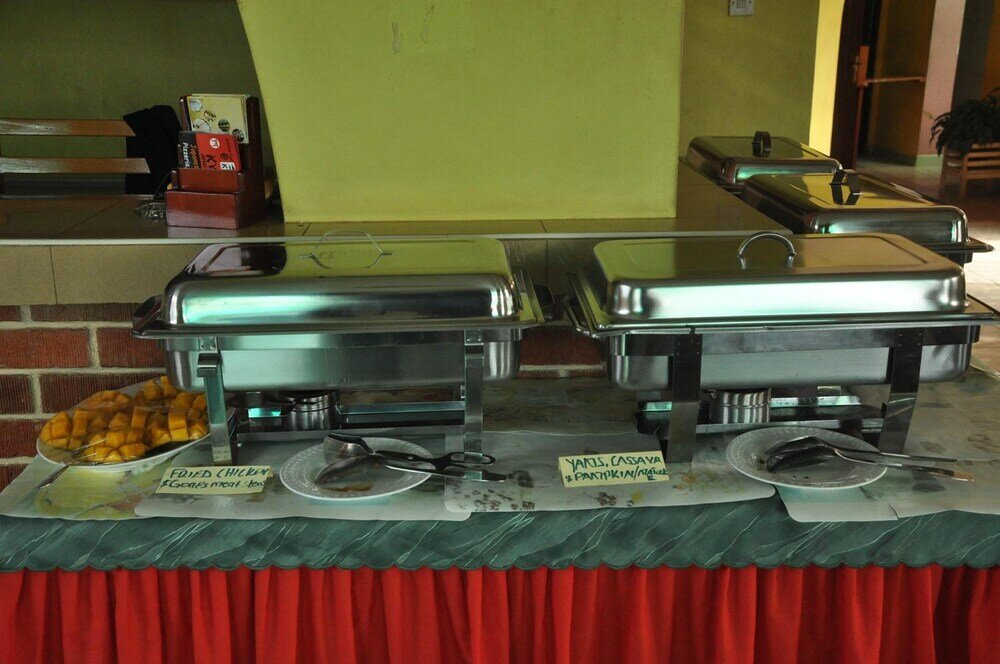 Фото New Scroll Inn Hotel