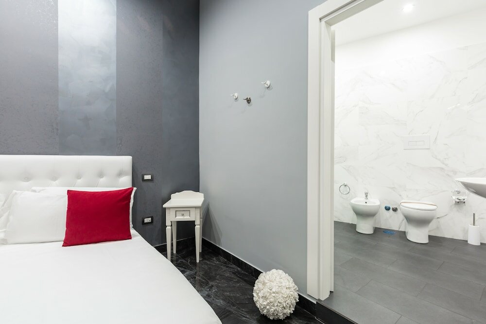 Фото Hotel Bella Napoli Suites