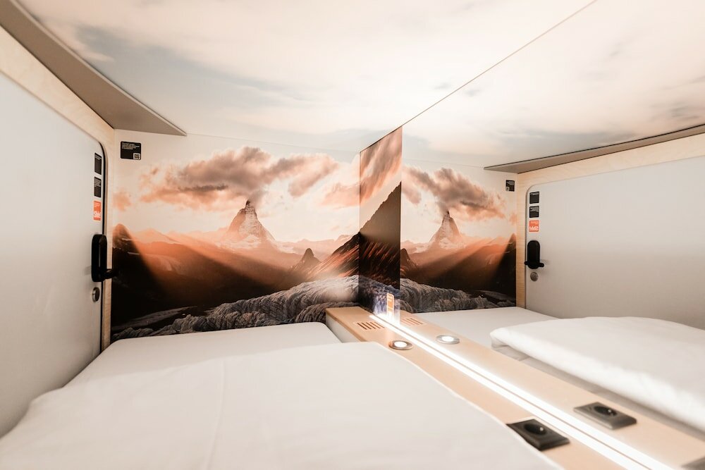 Фото Capsule Hotel - Alpine Garden Zurich Airport