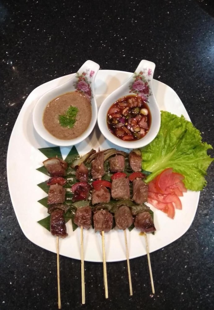 Фото Omah Madam Bed & Breakfast