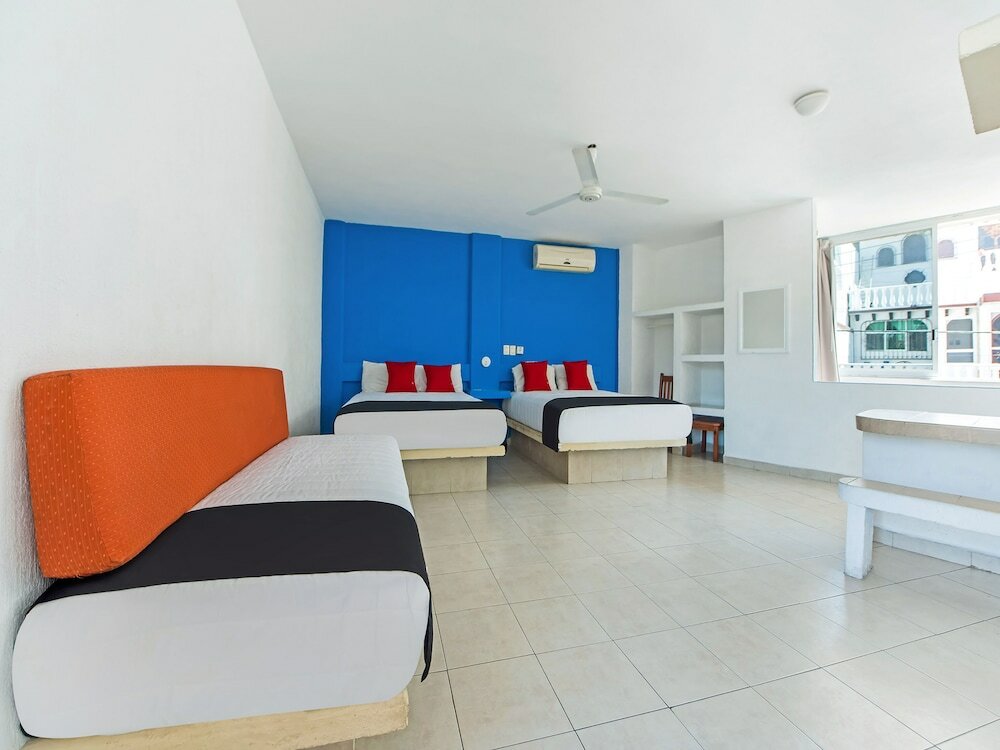 Фото Capital O Hotel El Mejicano