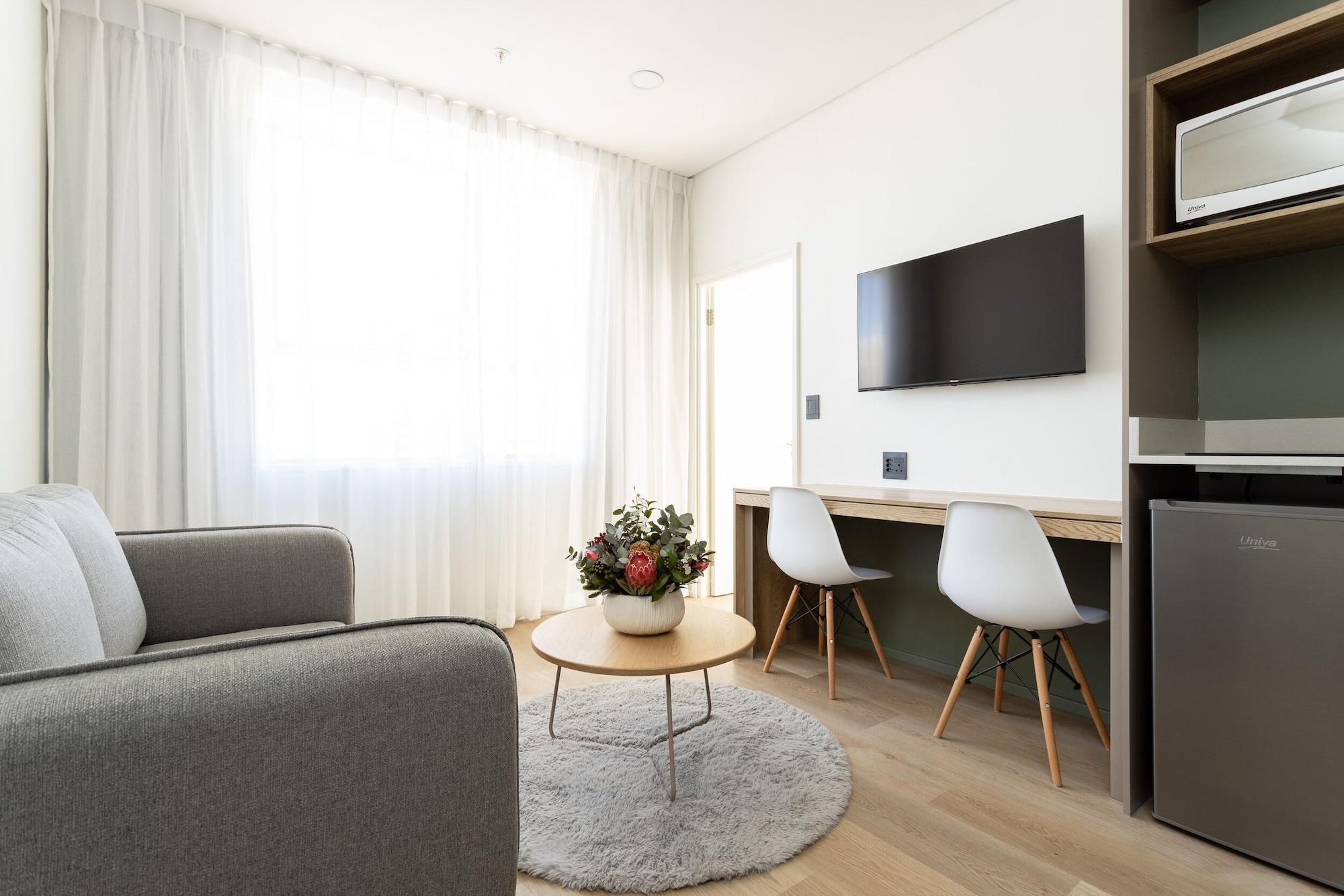 Фото Habitat Aparthotel by Totalstay