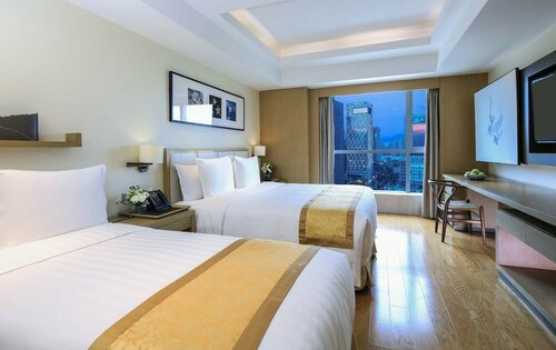 Внешний вид отеля Pan Pacific Serviced Suites Ningbo в Нинбо, фото 2