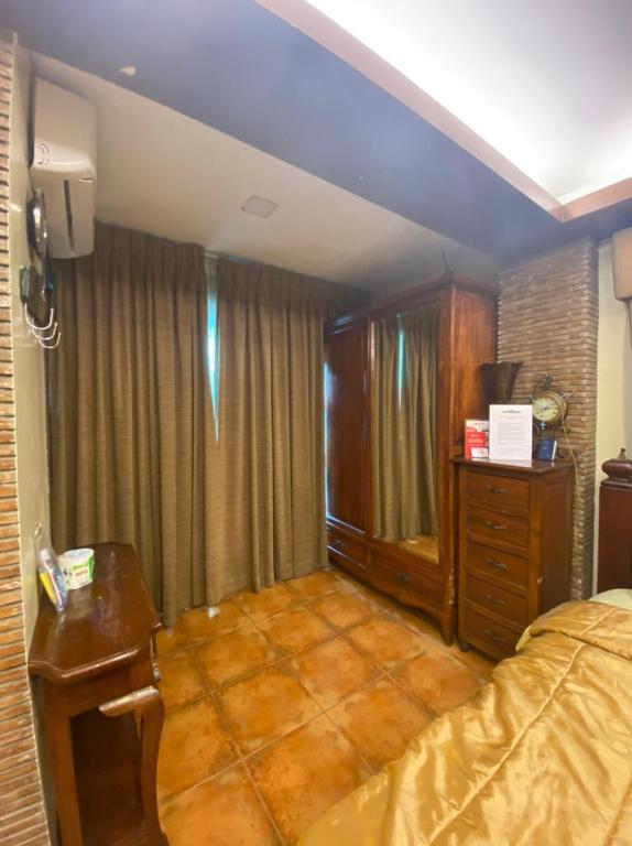 Фото Oyo 797 Brickwood Suites