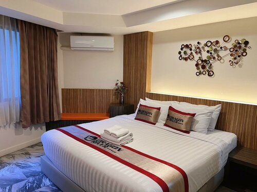Гостиница Dragon River Avenue Hotel в Пхитсанулоке