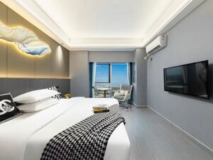 Апартаменты Xinyue Hotel