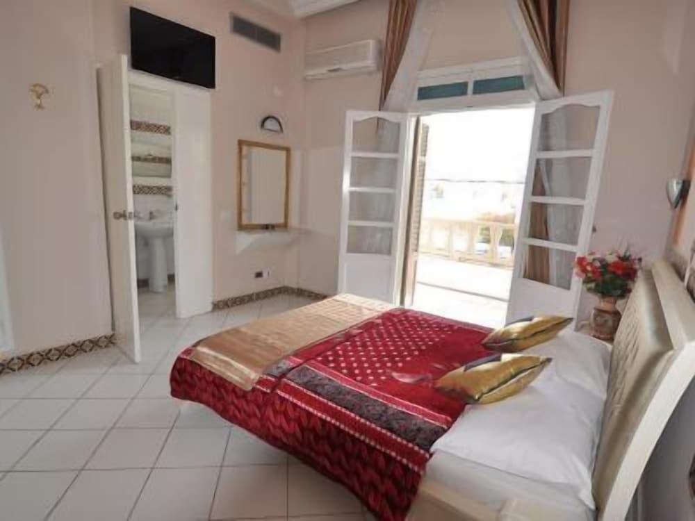 Фото Hôtel Les Palmes d'Or