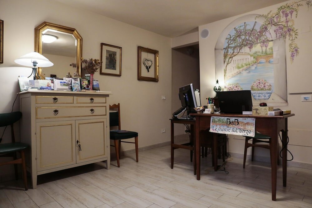 Фото Le Finestre Sul Borgo Rooms