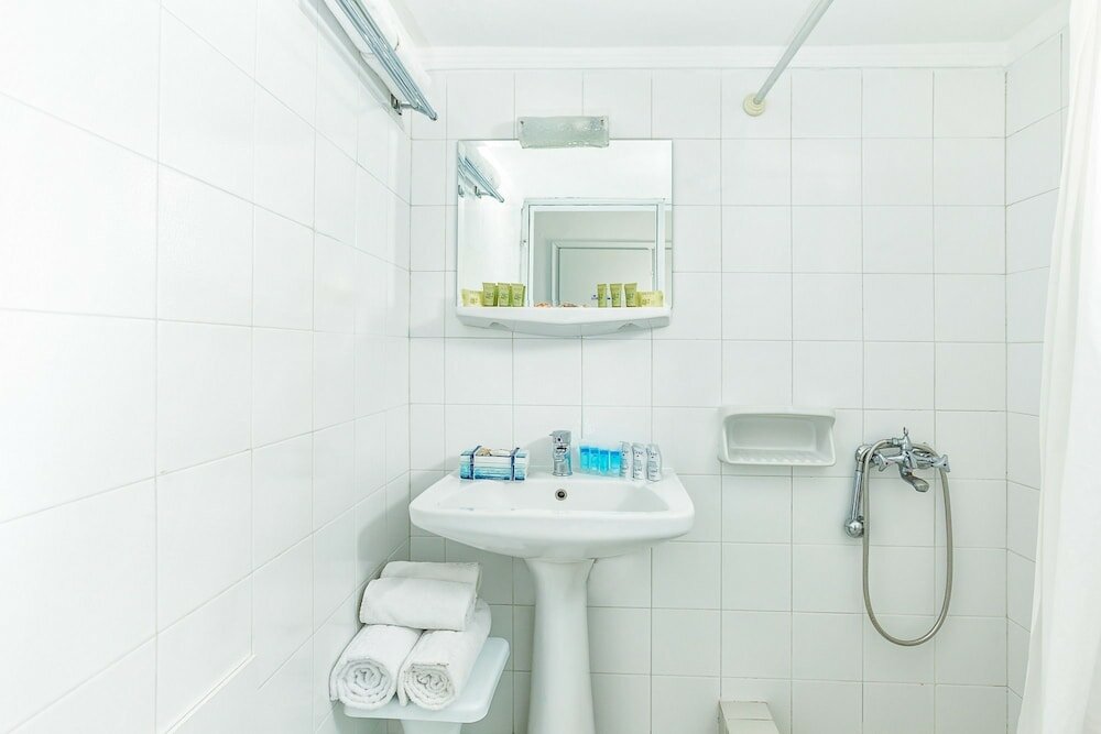 Фото Xenios Dolphin Beach Hotel