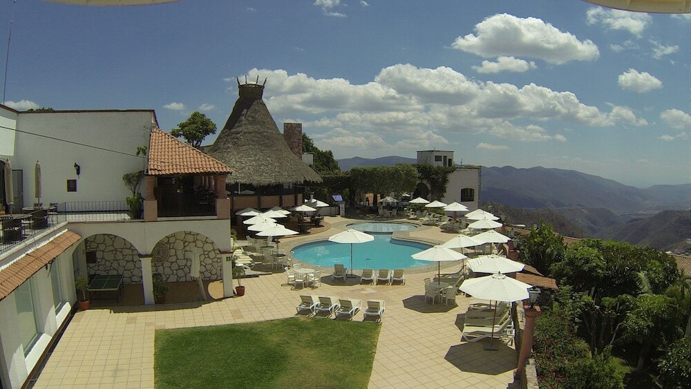Фото Hotel Montetaxco