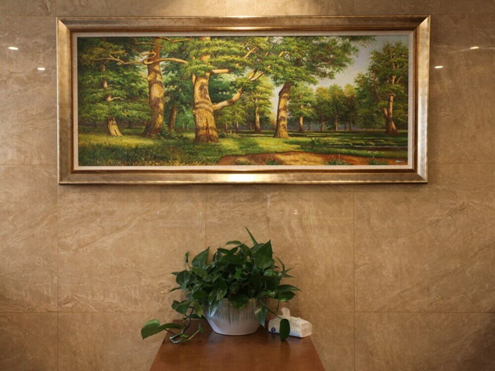 Фото Vatica ZaoZhuang TengZhou Railway Station Hotel