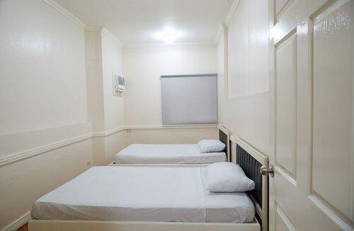 Гостиница Hidden Pearl Hotel - Janus Luxury Suites в Провинции Пампанга