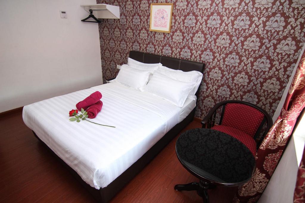 Фото Rose Cottage Hotel Taman Johor Jaya