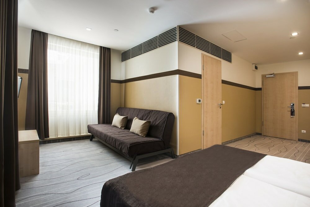 Фото Promenade City Hotel