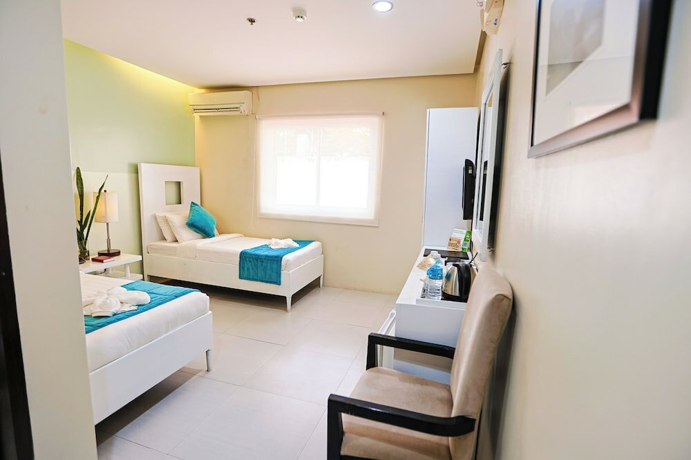 Фото Empire Suites Hotel