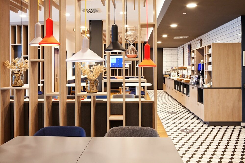 Фото Holiday Inn Express Munich - Olympiapark, an Ihg Hotel