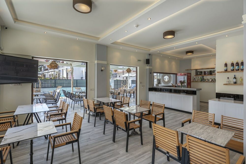 Фото Adonis Luxury Village