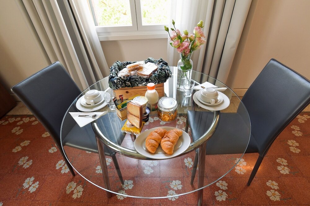 Фото Suites Farnese Design Hotel