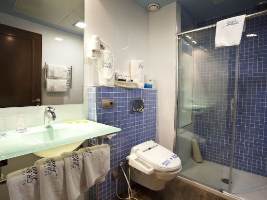 Фото Suites Gran VIA 44 Apartahotel