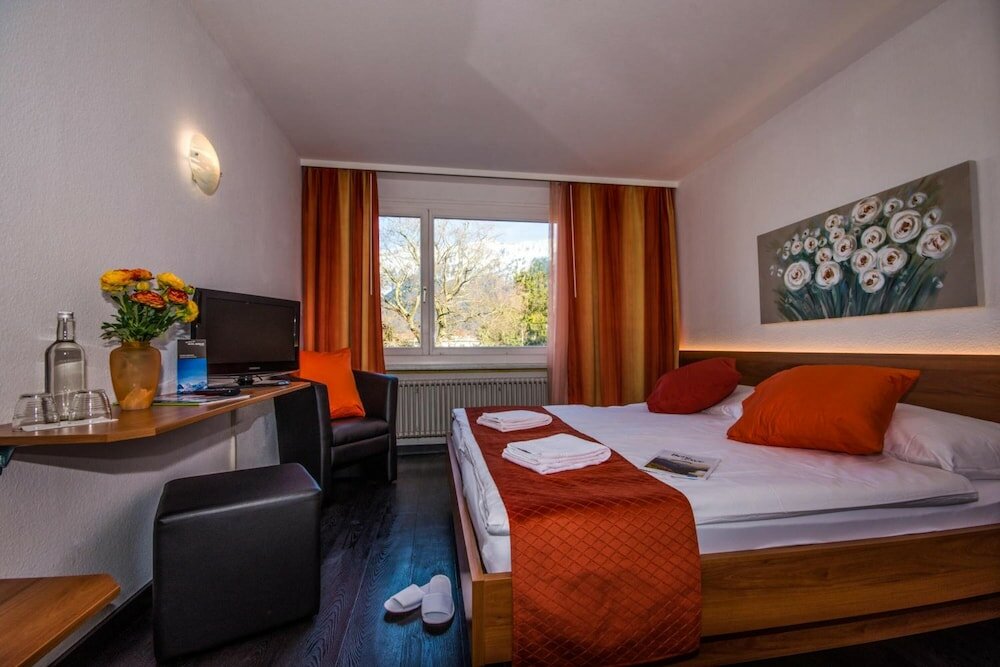 Фото Hotel Merkur Interlaken