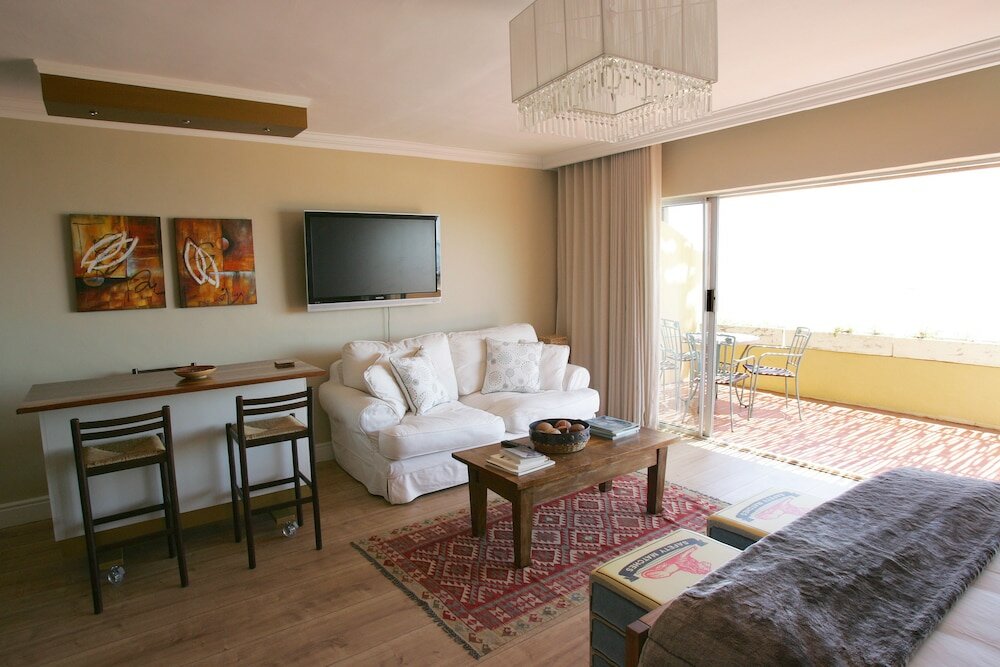 Фото Dolphin Inn Guesthouse