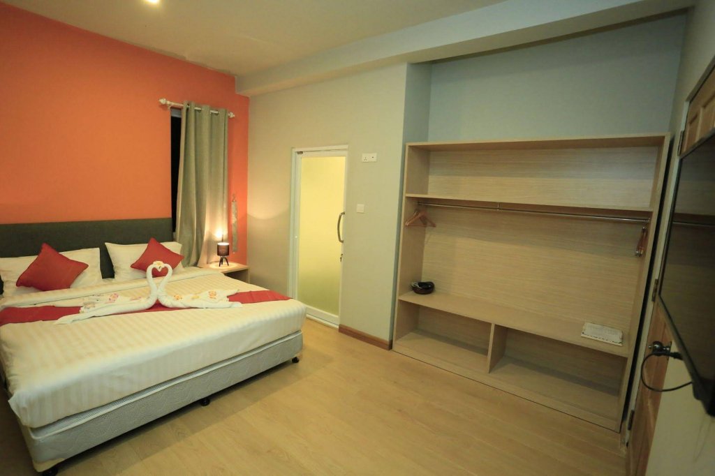 Фото Wh Hotel & Service Apartment