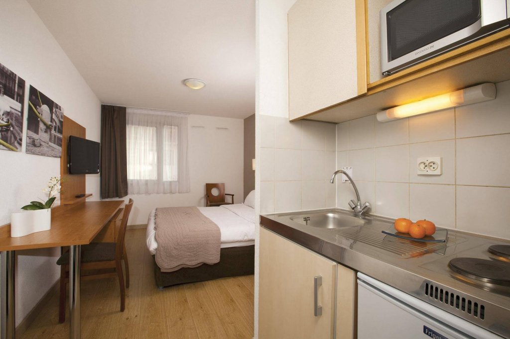 Фото Séjours & Affaires Charles de Gaulle