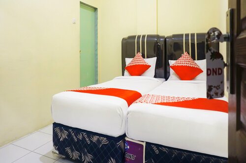 Гостиница Oyo 1192 Lotus Inn в Паканбару