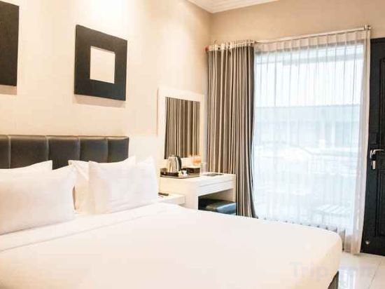 Фото Luminor Hotel Jember