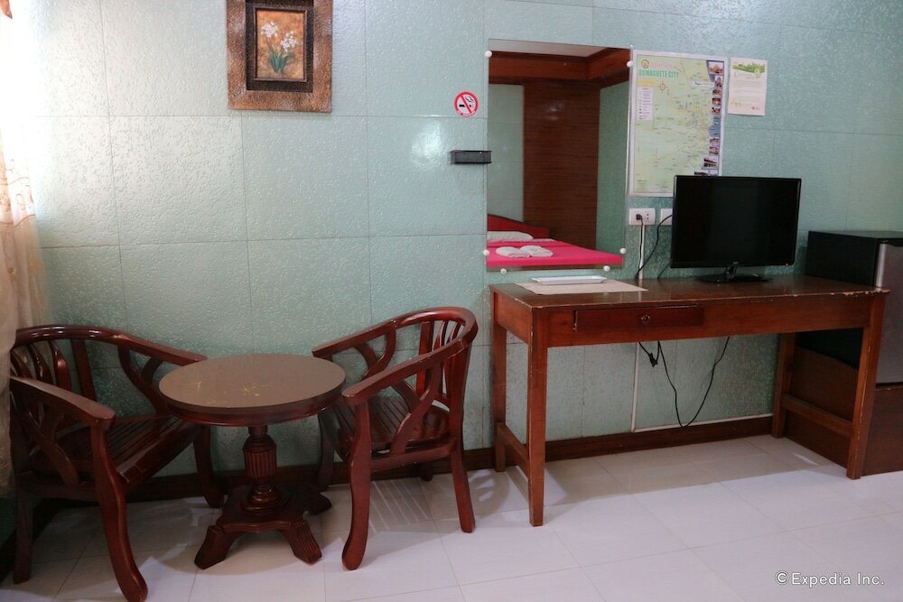 Фото Obdulia's Business Inn