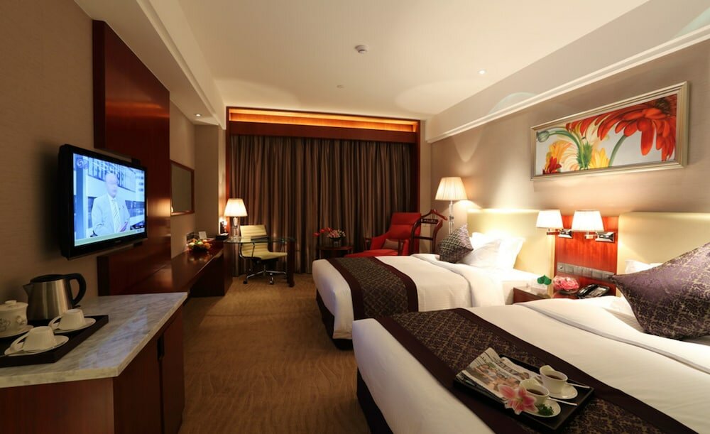 Фото Wuhan Tianchimel Hotel