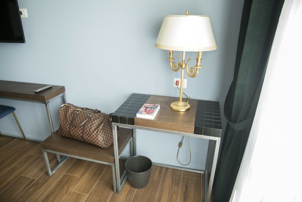 Фото Unicum Roma Suites