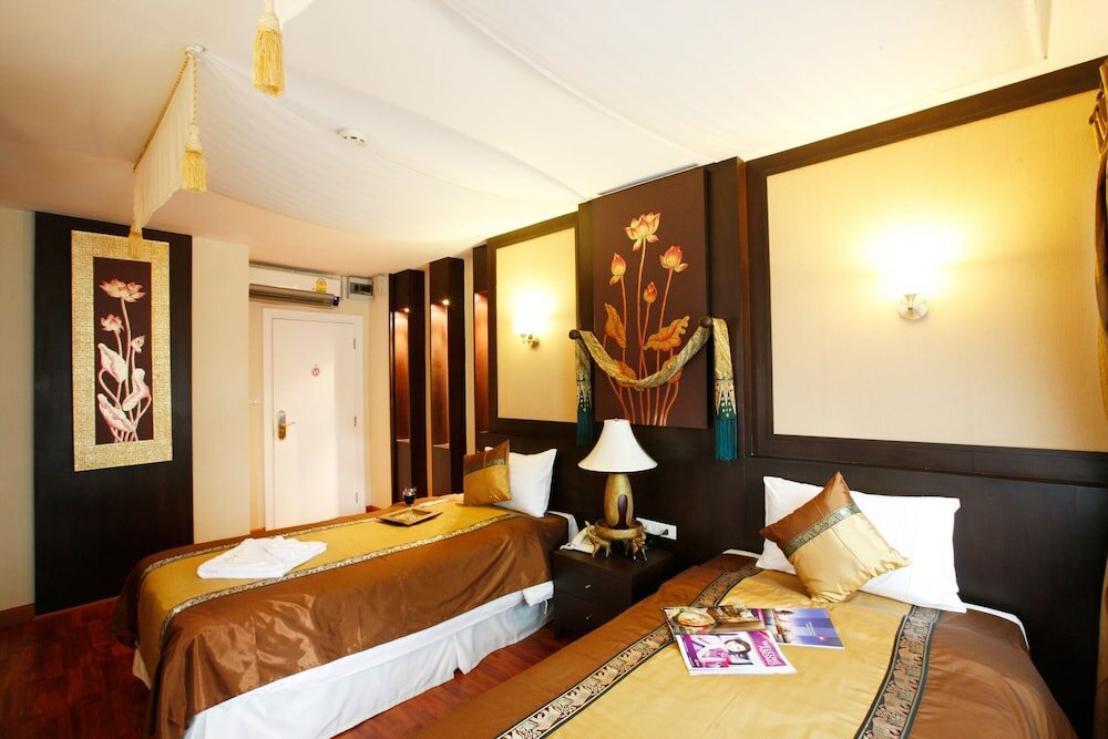 Фото Mirth Sathorn Hotel