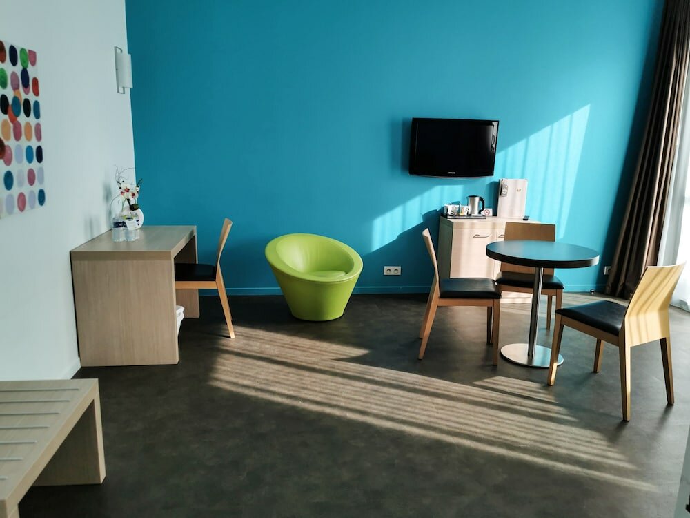 Фото Esatitude Hôtel