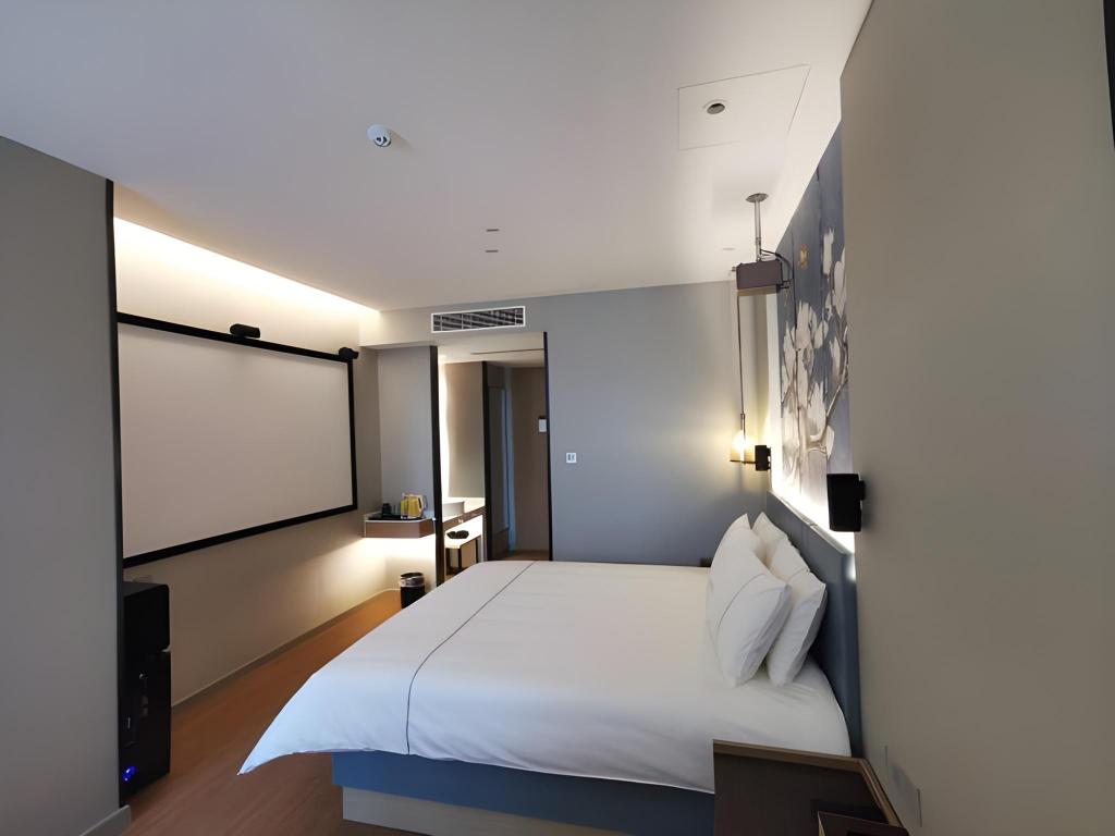 Фото Magnotel Jining Jiaxiang, Zengzi Avenue Hotel