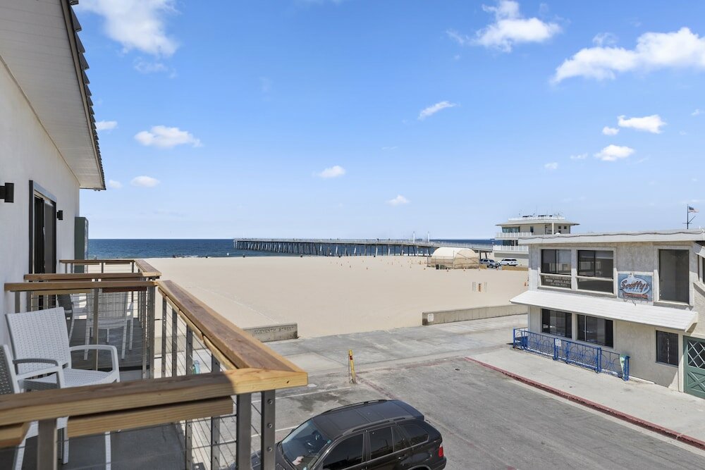 Фото Sea Sprite Oceanfront Hotel