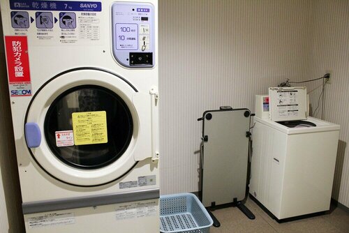 Гостиница Hiroshima Capsule Hotel & Sauna New Japan Ex - Caters to Men в Хиросиме