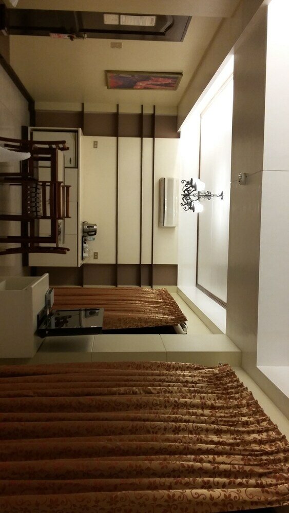 Фото Dumaguete Royal Suite Inn