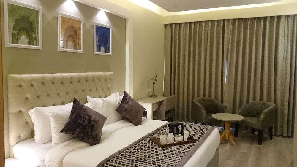 Фото Mango Hotels Naveen