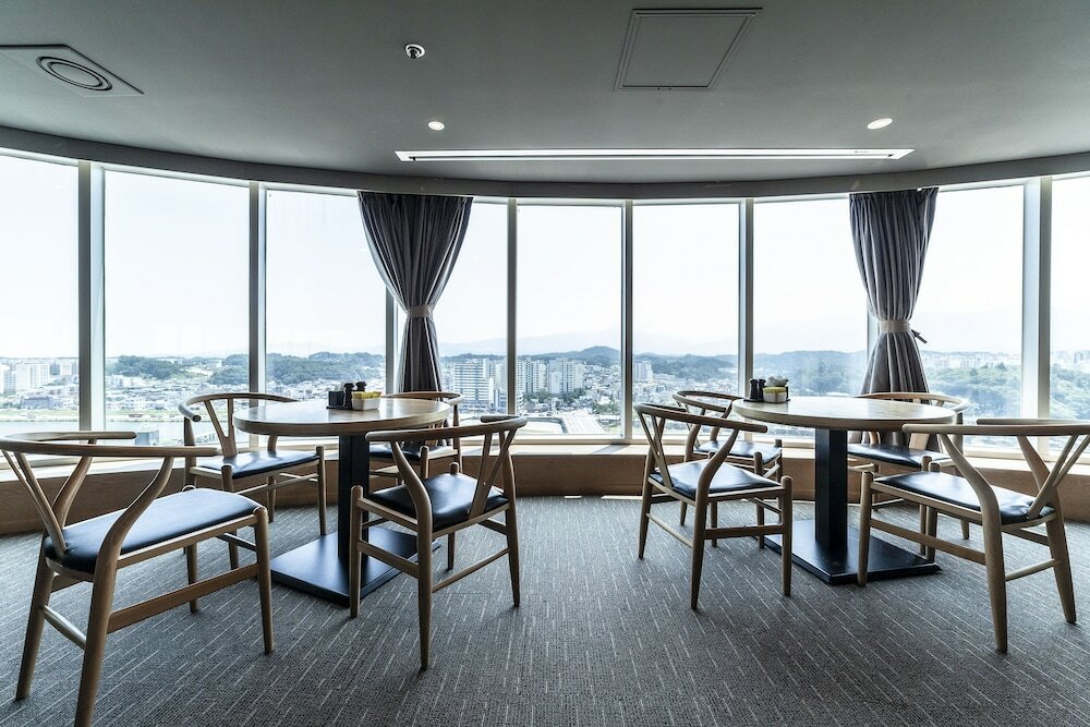 Фото Gangneung Tourist Hotel