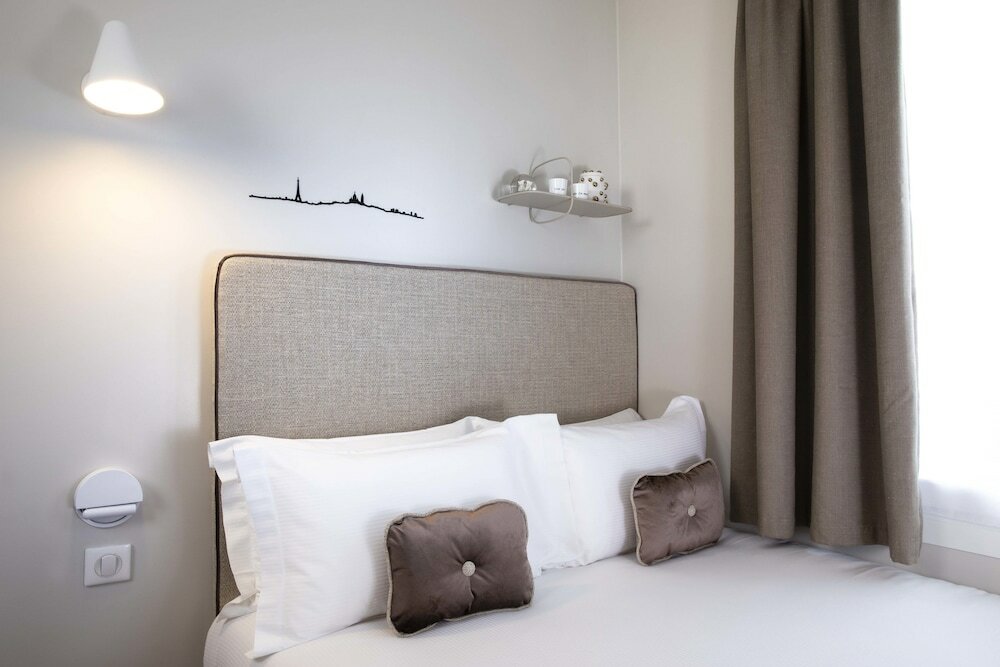 Фото Hôtel Eiffel Saint Charles