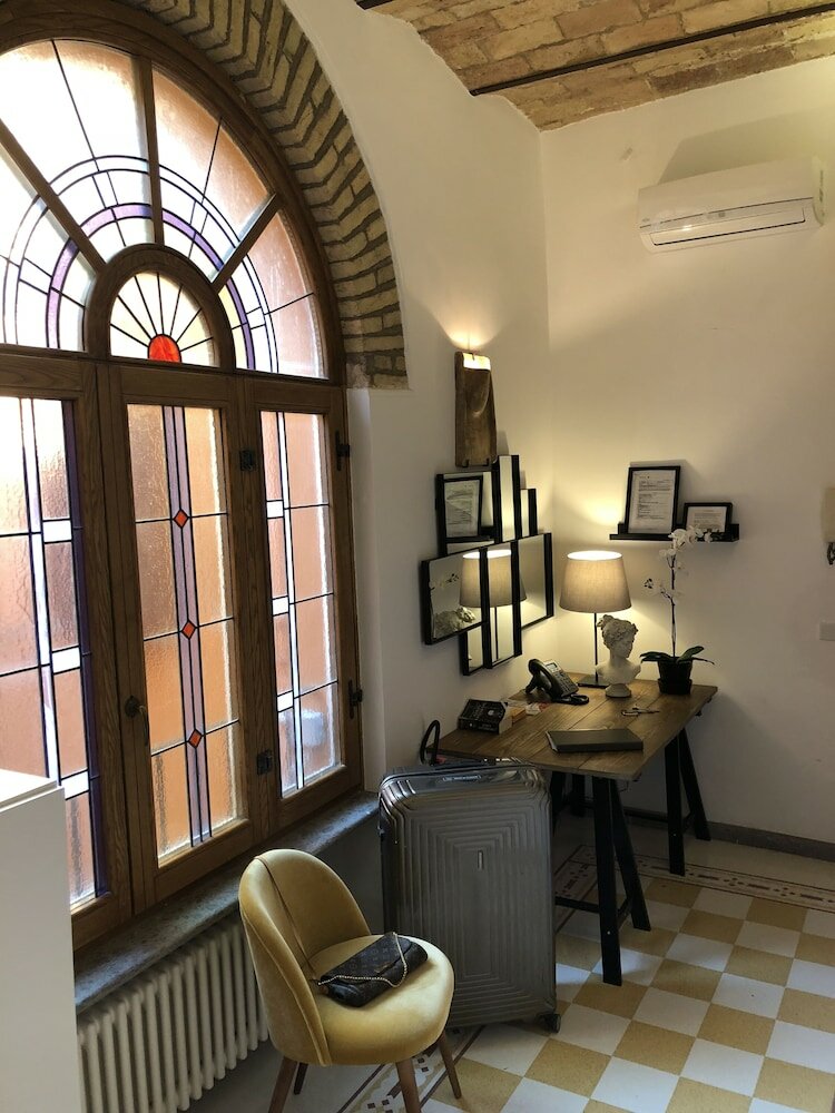 Фото Giuturna Boutique Hotel
