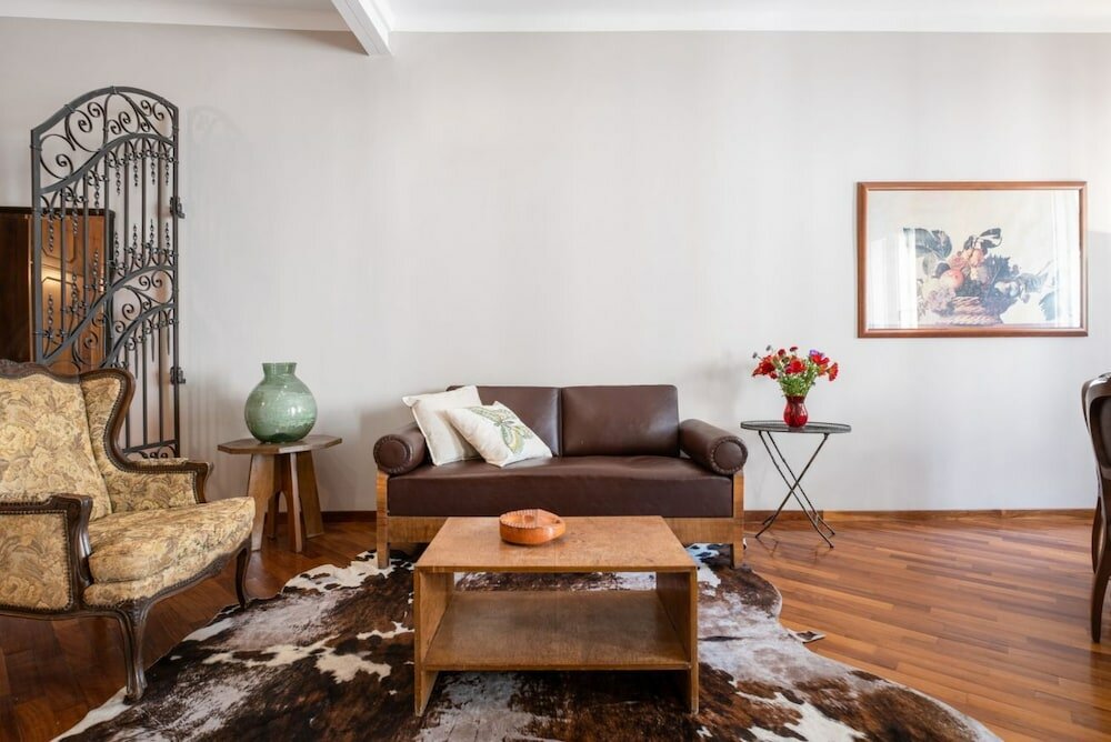 Фото A due passi dalla Pinacoteca Apartment